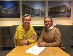 Nasjonal avdelingsleder for Arkitektur hos Asplan Viak, Cecilie Bjerke Skjømming og daglig leder for SMS Arkitekter AS, Heidi Nilssen har signert oppkjøpskontrakt.